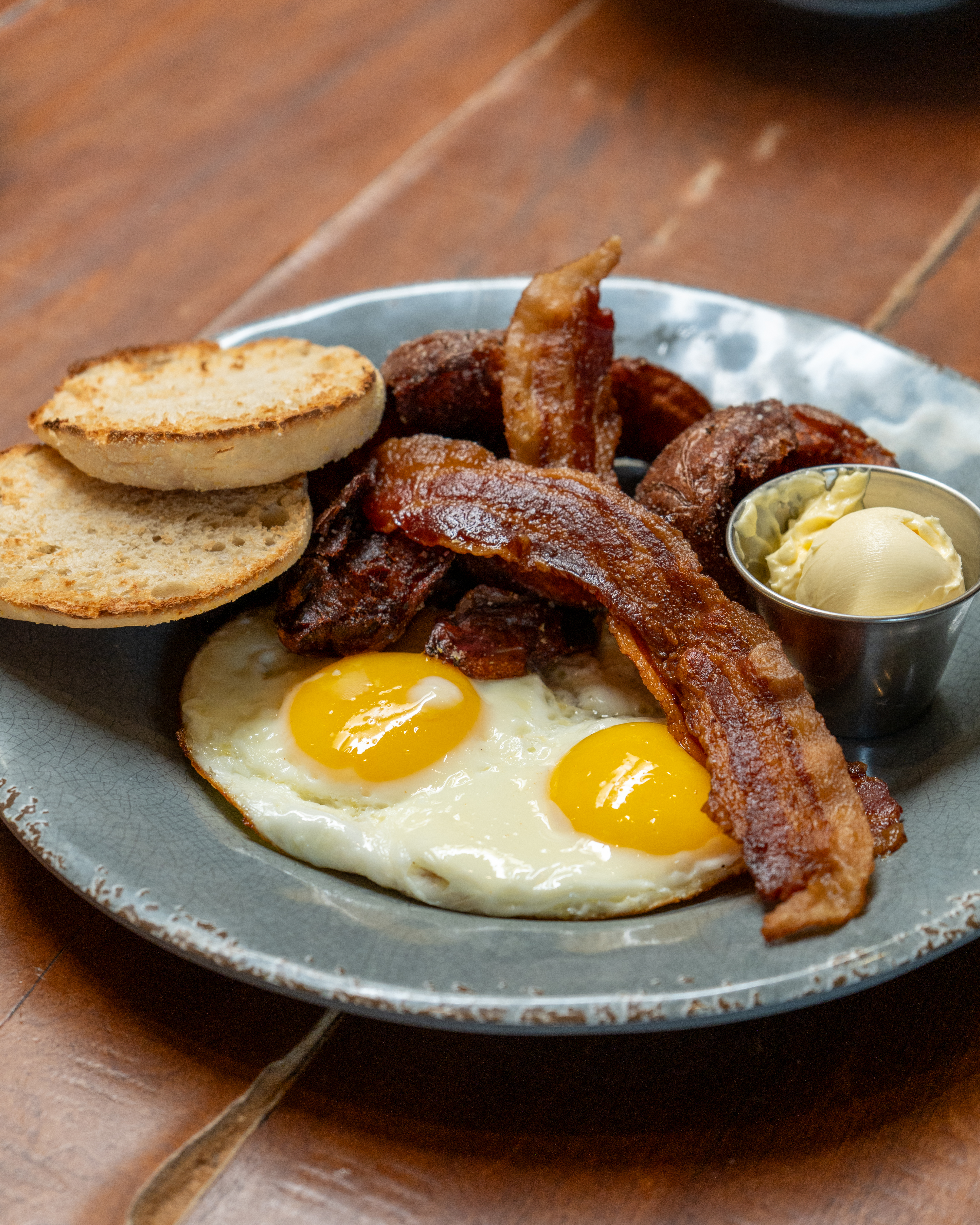 The Pioneer with egg, bacon, toast, and Pioneer potatoes